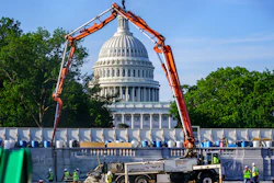 A concrete pump frames the Capitol Dome during renovations and repairs to Lower Senate Park on Capitol Hill in Washington on May 18.