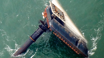 The capsized lift boat Seacor Power is seen seven miles off the coast of Louisiana in the Gulf of Mexico, April 18, 2021.