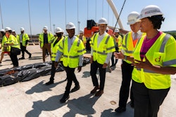 From right, District of Columbia Mayor Muriel Bowser, Secretary of Labor Marty Walsh, and Secretary of Transportation Pete Buttigieg at the Frederick Douglass Memorial Bridge in Washington, May 19, 2021.