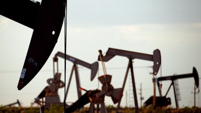 Pumpjacks in a field near Lovington, N.M., April 24, 2015.