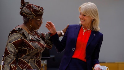 World Trade Organization Director-General Ngozi Okonjo-Iweala, left, talks to Sweden's Foreign Trade Minister Anna Hallberg during a European Foreign Trade ministers meeting at the European Council headquarters in Brussels, May 20, 2021.