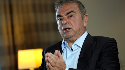 Fugitive ex-auto magnate Carlos Ghosn speaks during an interview with the Associated Press, Dbayeh, Lebanon, May 25, 2021.