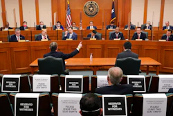 Curtis Morgan, CEO of Vistra Corp., at table left, testifies at a joint Committees on State Affairs and Energy Resources hearing, Austin, Texas, Feb. 25, 2021.