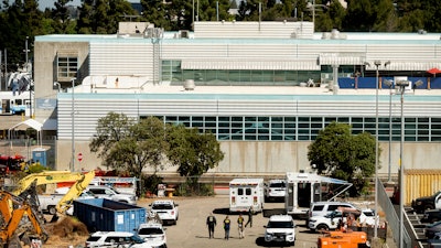 Law enforcement officers respond to the scene of a shooting at a Santa Clara Valley Transportation Authority facility, San Jose, May 26, 2021.