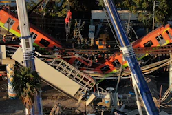 Subway cars dangle at an angle from a collapsed elevated section of the metro Number 12 Line, in Mexico City, Tuesday, May 4, 2021.