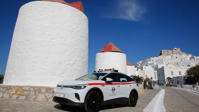 A Volkswagen ID.4 electric car of the Civil Aviation is parked on the Aegean Sea island of Astypalea, Greece during the official launch of a project to introduce and test electric vehicles and sustainable energy systems on Wednesday, June 2, 2021. The government has partnered with the German carmaker on the island project aimed a switching to electric vehicle use over the next five years.