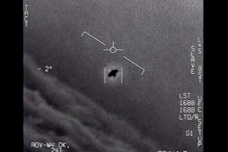 Image from a 2015 video, labelled Gimbal, shows an unexplained object tracked as it soars high along the clouds, traveling against the wind.