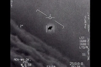 An unexplained object in 2015, at center, tracked as it soars high along the clouds against the wind.