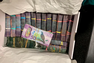 A box containing a large amount of cash was discovered during a police raid as part of Operation Trojan.