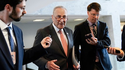 Senate Majority Leader Chuck Schumer, D-N.Y., talks with reporters on Capitol Hill in Washington, June 8, 2021.