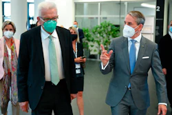 The Governor of Baden-Wuerttemberg, Winfried Kretschmann, front left, and Martin Jetter, front right, CEO of IBM Europe, attend the official inauguration of the first commercially used quantum computer in Europe, Ehningen, Germany, June 15, 2021.