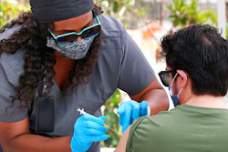 An Orange County resident receives the COVID-19 vaccine at the Florida Division of Emergency Management mobile vaccination site at Camping World Stadium in Orlando, June 17, 2021.