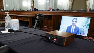 Google CEO Sundar Pichais speaks remotely during a hearing before the Senate Commerce Committee on Capitol Hill, Oct. 28, 2020.