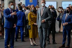 Spanish prime minister Pedro Sanchez (left), Spain's King Felipe VI (center) and Catalan regional president Pere Aragones visit the Mobile World Congress 2021 venue in Barcelona, June, 28, 2021.