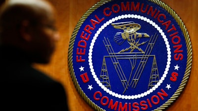 The seal of the Federal Communications Commission before a meeting in Washington, Dec. 14, 2017.