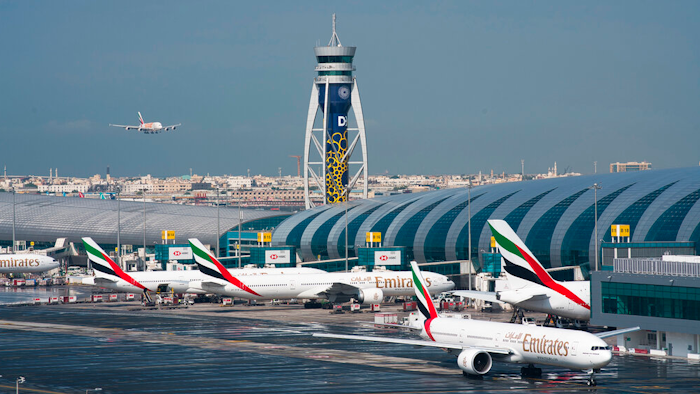 An Emirates jetliner comes in for landing at Dubai International Airport, Dec. 11, 2019.