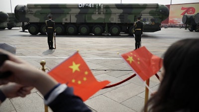 Military vehicles during a parade to commemorate the 70th anniversary of the founding of Communist China, Beijing, Oct. 1, 2019.