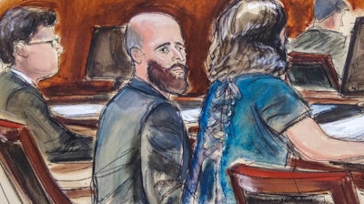 Courtroom sketch of Joshua Schulte, center, flanked by his attorneys during jury deliberations in New York, March 4, 2020.