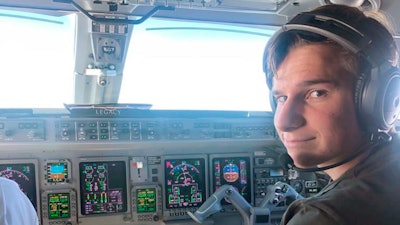 A 2021 photo showing Oliver Daemen in an airplane cockpit.