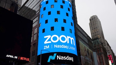 A sign for Zoom Video Communications ahead of the company's Nasdaq IPO in New York, April 18, 2019.