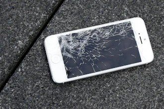 An iPhone with a cracked screen after a drop test in San Francisco, Aug. 26, 2015.