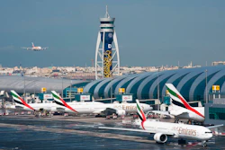 An Emirates jetliner comes in for landing at Dubai International Airport, Dec. 11, 2019.