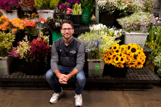 Steven Dyme, owner of Flowers for Dreams, poses for a portrait at his warehouse, July 23, 2021, Chicago.