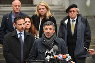 Ian Hockley, father of Dylan Hockley, one of the children killed in the 2012 Sandy Hook shooting, addresses the media after a hearing before the state Supreme Court in Hartford, Conn., Nov. 14, 2017.