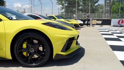 Director of marketing for Chevrolet cars and crossovers Tony Johnson during a press conference for the 2022 Corvette Stingray IMSA GTLM Championship Edition, foreground, Detroit, June 9, 2021.