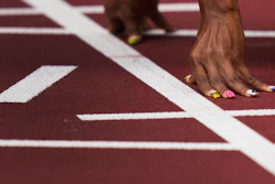 U.S. sprinter Javianne Oliver prepares to start in her heat of the women's 100-meters at the 2020 Summer Olympics, July 30, 2021, Tokyo.