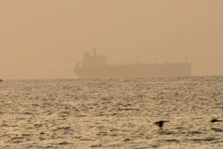 The oil tanker Mercer Street, which came under attack last week off Oman, is seen moored off Fujairah, United Arab Emirates, Aug. 4, 2021.