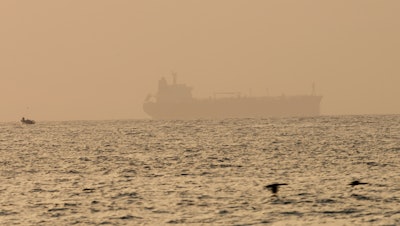 The oil tanker Mercer Street, which came under attack last week off Oman, is seen moored off Fujairah, United Arab Emirates, Aug. 4, 2021.