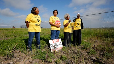 From left, Myrtle Felton, Sharon Lavigne, Gail LeBoeuf and Rita Cooper of RISE St. James conduct a live stream video on property owned by Formosa Plastics, St. James Parish, La., March 11, 2020.