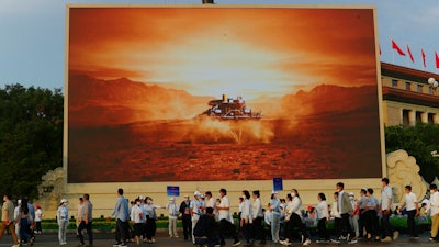 Screen depicting China's Mars spacecraft with its rover landing, Beijing, July 1, 2021.