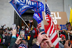 Insurrections loyal to President Trump riot outside the Capitol in Washington, Jan. 6, 2021.