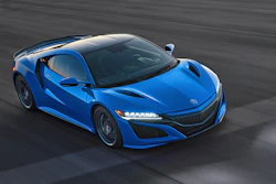 This photo provided by Acura shows the 2021 Acura NSX, an exotic sports car with a hybrid powertrain and sharp handling.