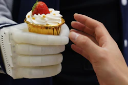 An MIT-developed inflatable robotic hand gives amputees real-time tactile control.