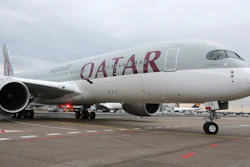 In this Jan. 15, 2015 file photo, a new Qatar Airways Airbus A350 approaches the gate at the airport in Frankfurt, Germany. Qatar Airways said Thursday, Aug. 5, 2021, that it has grounded 13 Airbus A350s over degradation of the plane's fuselage, further escalating a monthslong dispute with the European airplane maker.