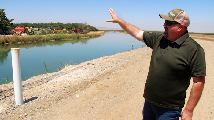 Kevin Spesert, public affairs and real estate manager for the Sites Project Authority, at the main canal of the Glenn Colusa Irrigation District near Sites, Calif., July 23, 2021.