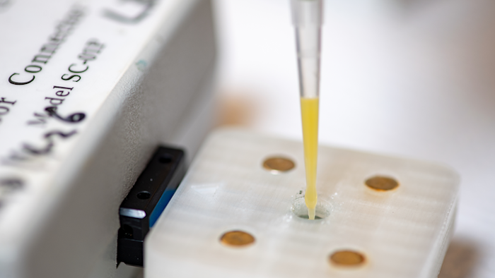 Engineers tested the sensor device on samples of orange juice that they spiked with glyphosate for the study.
