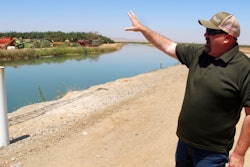 Kevin Spesert, public affairs and real estate manager for the Sites Project Authority, at the main canal of the Glenn Colusa Irrigation District near Sites, Calif., July 23, 2021.