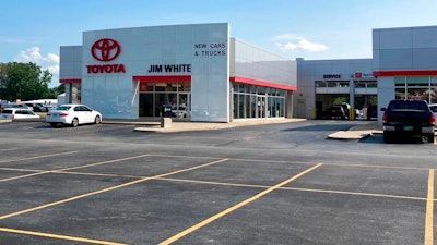 Depleted new car lot at Jim White Toyota outside Toledo, Ohio, Aug. 27, 2021.