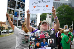 Lynn Wencus of Wrentham, Mass., during a protest at Purdue Pharma LLP headquarters in Stamford, Conn., Aug. 17, 2018.