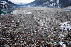 Plastic bottles and other garbage floats in the Potpecko lake near Priboj, Serbia, Jan. 22, 2021.