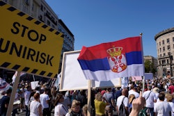 People attend a protest against pollution and the exploitation of a lithium mine, Belgrade, Serbia, Sept. 11, 2021.