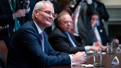 Exxon Mobil CEO Darren Woods during a meeting with energy sector leaders in the Cabinet Room of the White House, April 3, 2020.