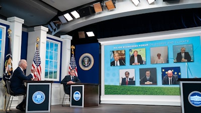 Secretary of State Antony Blinken listens as President Joe Biden delivers remarks to the Major Economies Forum on Energy and Climate, South Court Auditorium on the White House campus, Sept. 17, 2021.