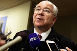 Rafael Ramirez, security council president and Venezuela's ambassador to the U.N., talks to reporters, Feb. 25, 2016.