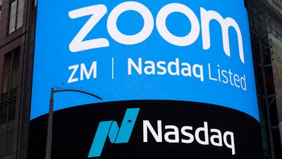 A sign for Zoom Video Communications ahead of their Nasdaq IPO in New York, April 18, 2019.