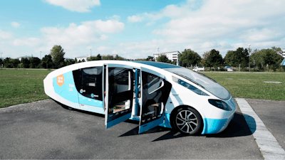 Stella Vita solar-powered vehicle on a closed road in Guyancourt, France, Sept. 24, 2021.